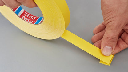 tesa® 4651 Premium Acrylic Coated Colored Cloth Tape - tesa-4651-premium-colored-cloth-tape-yellow-step1of6-ap.jpg