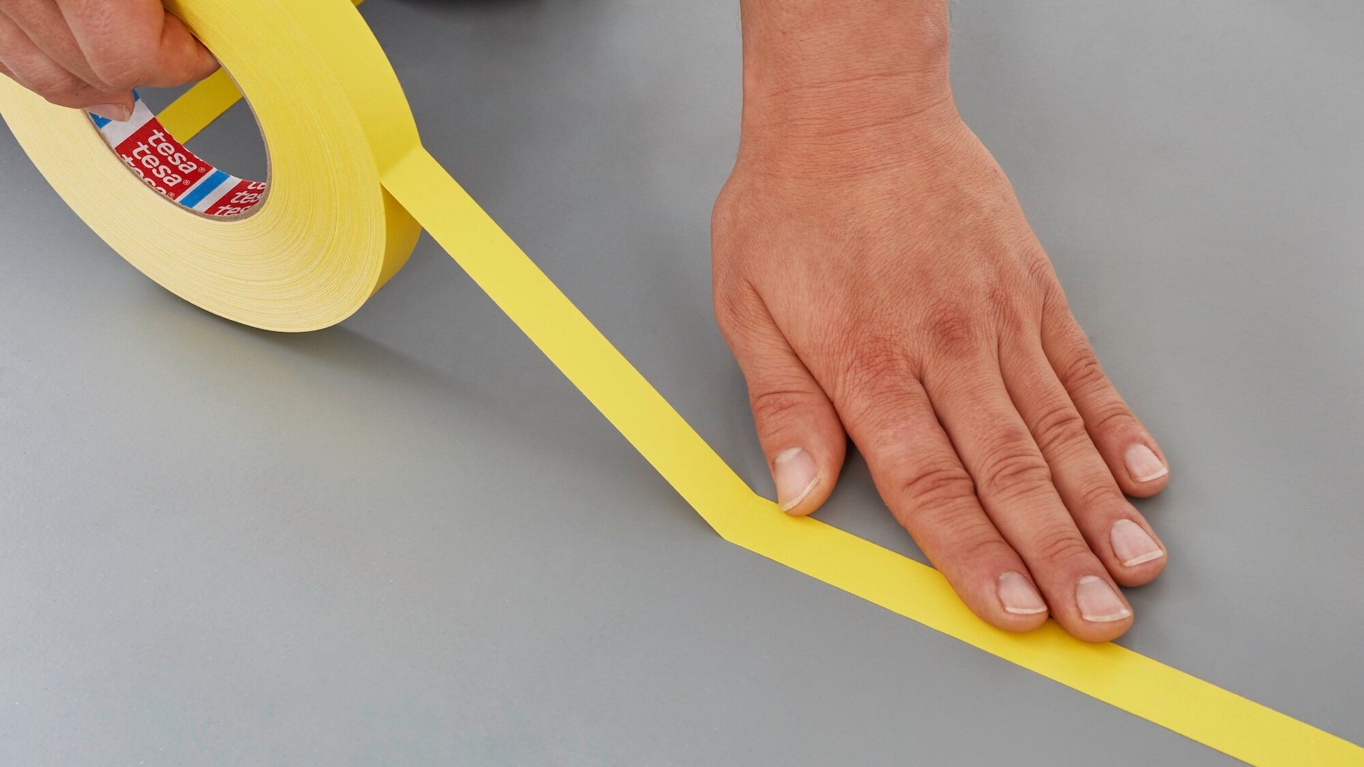 tesa® 4651 Premium Acrylic Coated Colored Cloth Tape - tesa-4651-premium-colored-cloth-tape-yellow-step2of6-ap.jpg