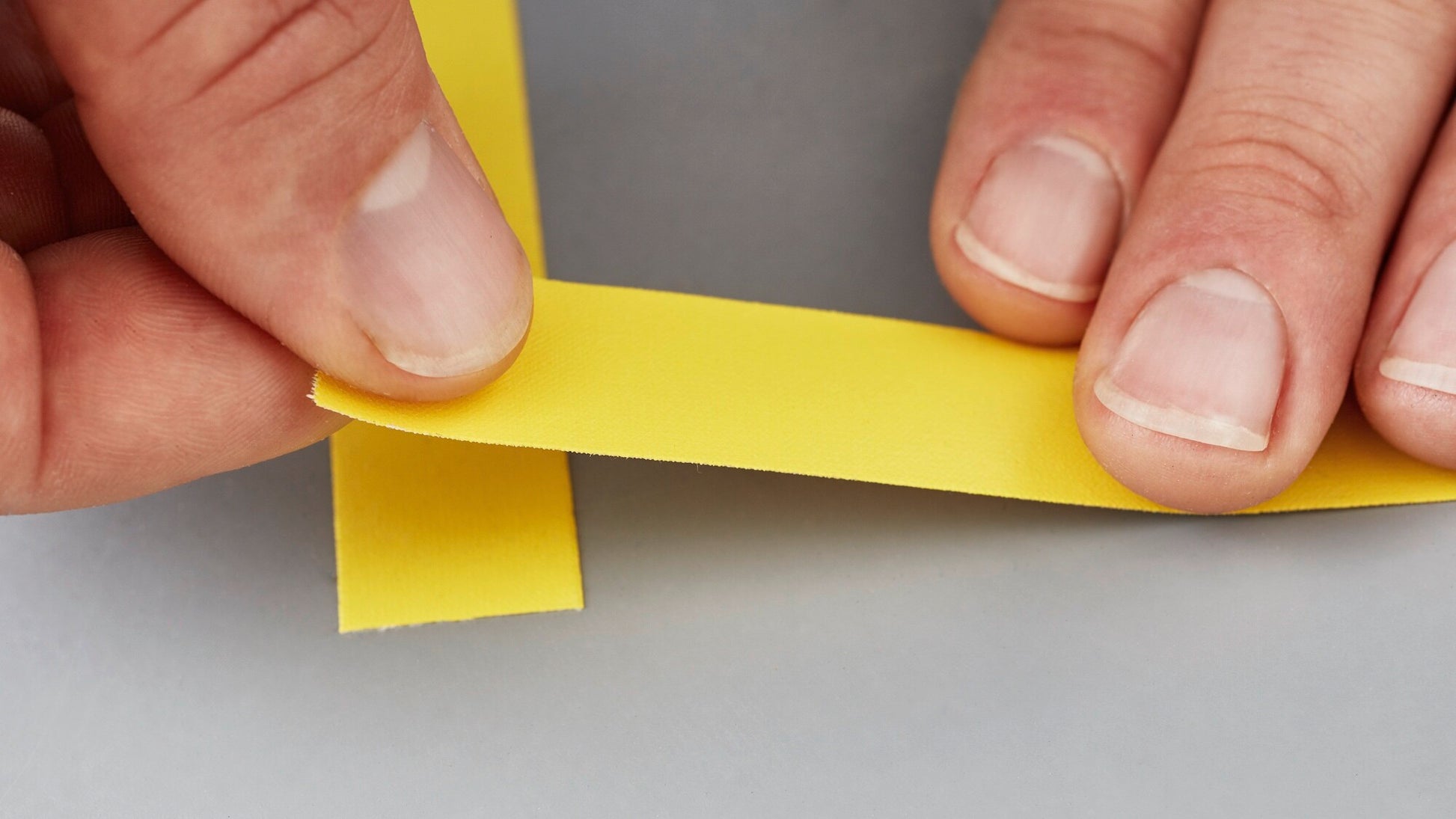 tesa® 4651 Premium Acrylic Coated Colored Cloth Tape - tesa-4651-premium-colored-cloth-tape-yellow-step4of6-ap.jpg