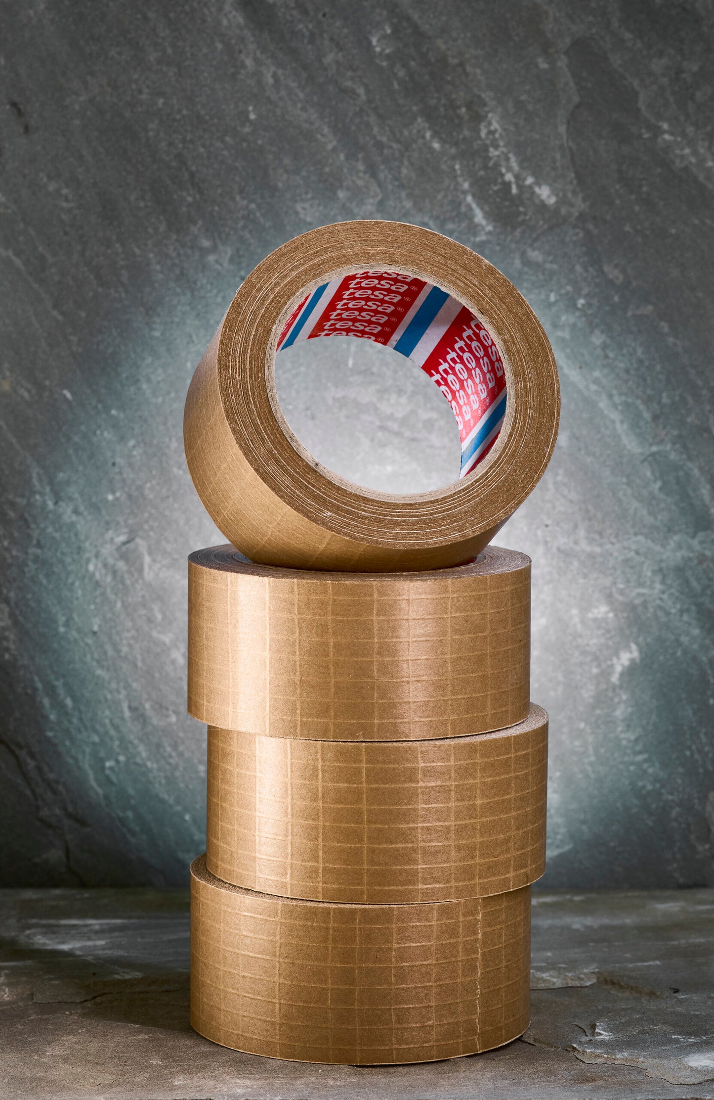 tesa® 60013 tesa® 60013 – Self-Adhesive Reinforced Paper Tape - tesa-60013-self-adhesive-reinforced-paper-packaging-tape-09-ap.jpg